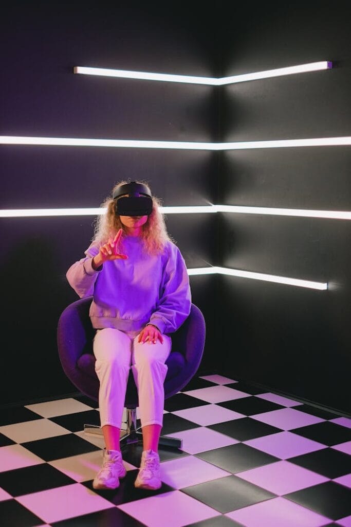 Adult woman in VR headset experiencing virtual reality in stylish, futuristic room.